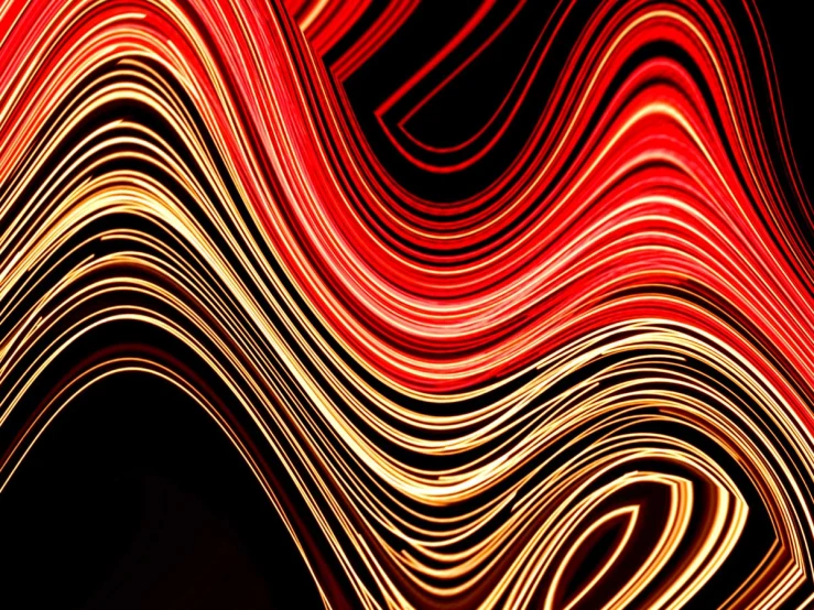 red waves of light against black background