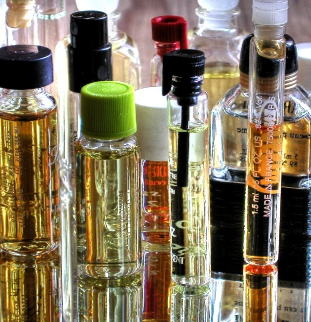 various bottles are lined up on the floor