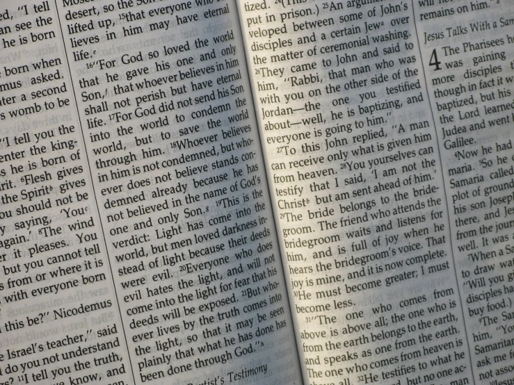 the pages of a newspaper with words written in it