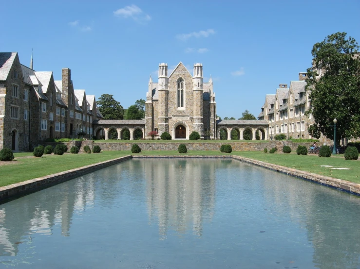 a pond in the middle of a long building