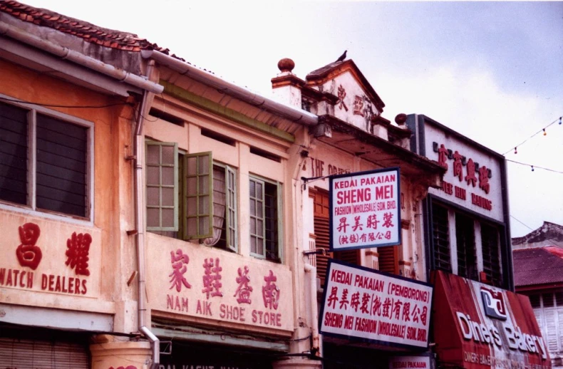 many different buildings with signs on the side of them