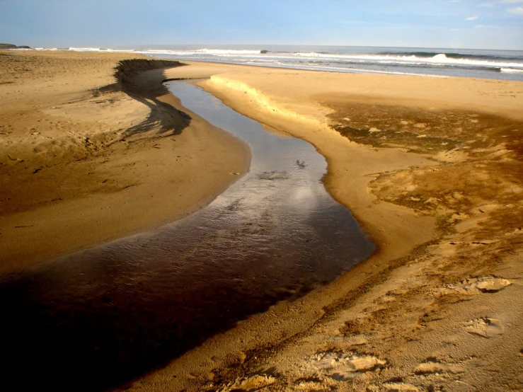 there is water coming out from the ocean