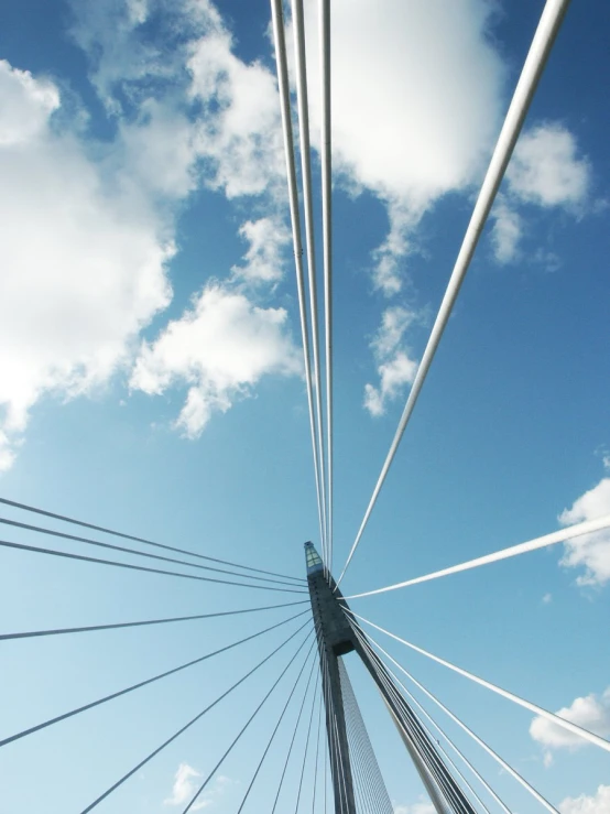 an image of a large bridge going into the clouds