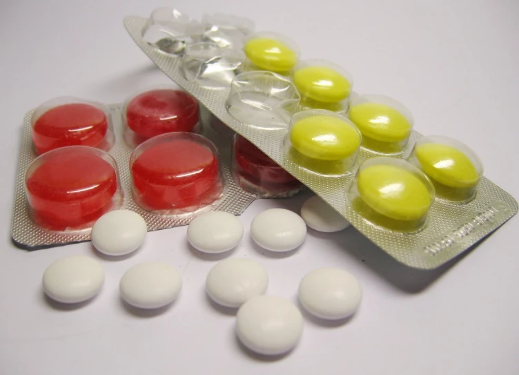 a package of red, yellow, and white pills