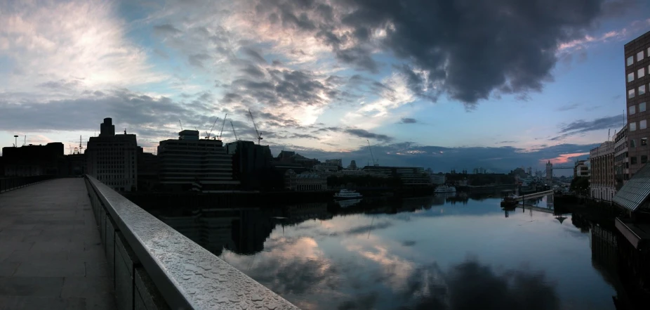 a view from the top of a bridge of a city