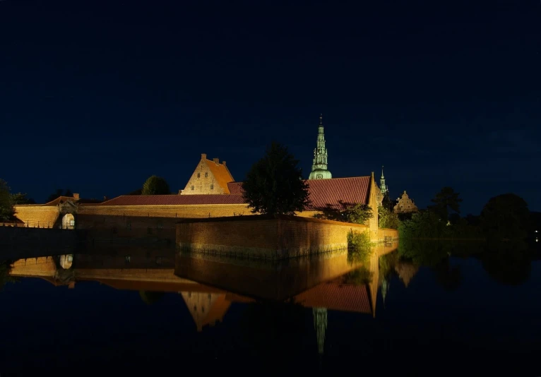 there are some buildings and lights along this river