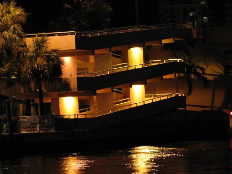 two balconies of some sort, lit up by a number of lighting on