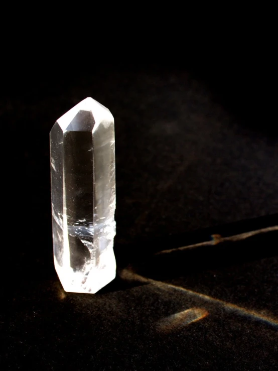 a close up of a clear glass object on a table