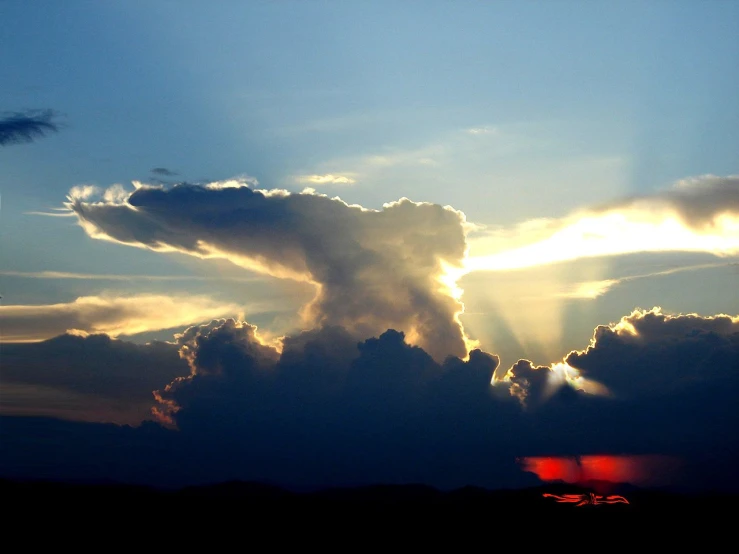 an image of some clouds in the sky