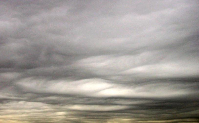 the horizon with a single kite in the sky