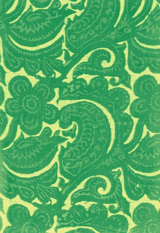 an intricate green and yellow background with leaves