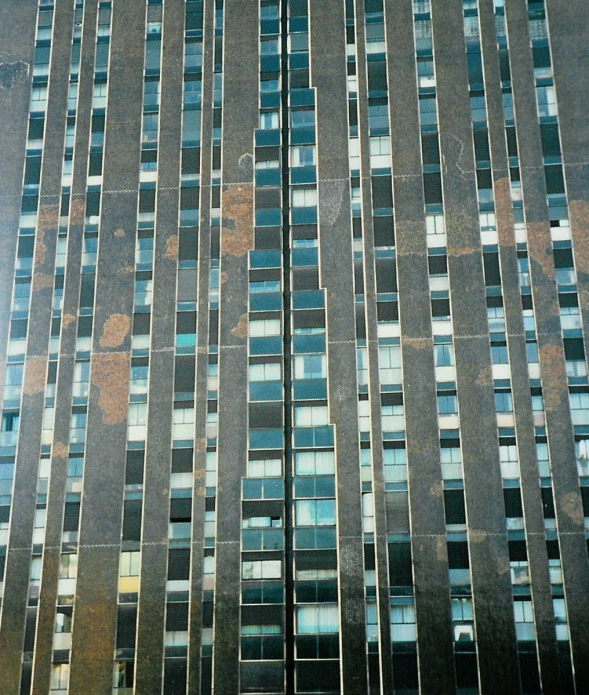 a building with multiple window panes on the side