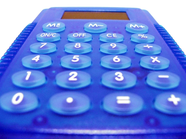a closeup view of a blue calculator on a table