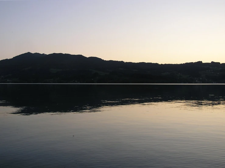 view from the water of the mountains and a river