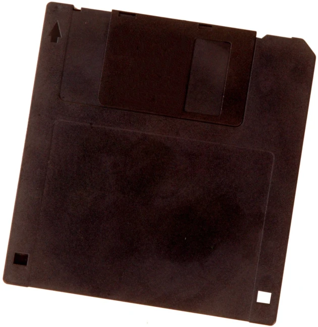 a floppy disk that is brown color with a on at the bottom