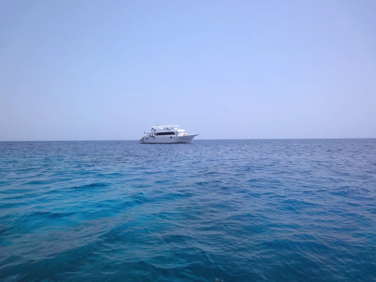 a large boat floating on top of the ocean