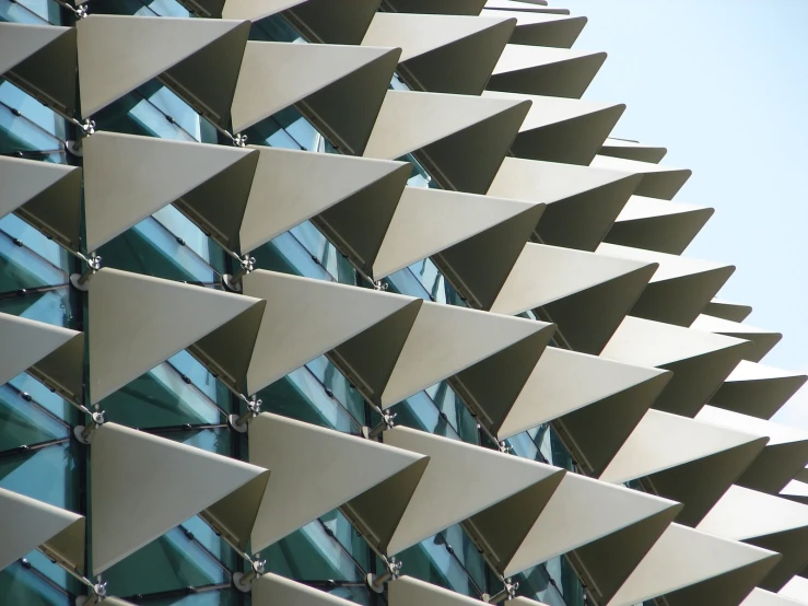 a closeup image of the top of a building with triangular shapes