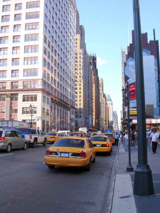 a number of cars parked on a street