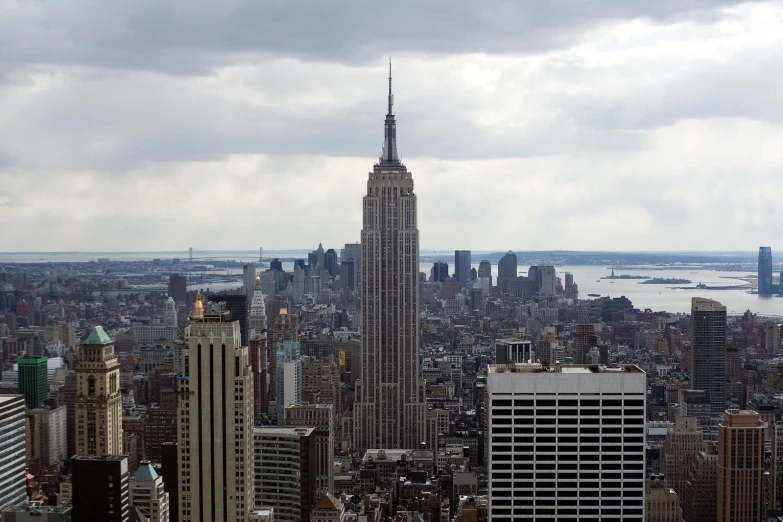 an aerial view of skyscrs in the city