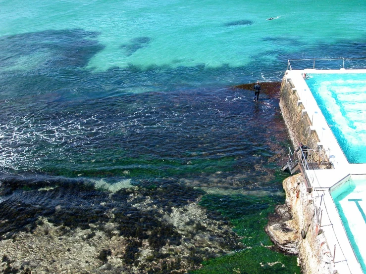 an aerial view of a long swimming pool