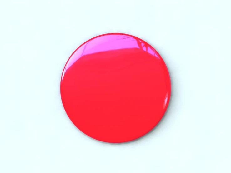 a red circle on a white surface