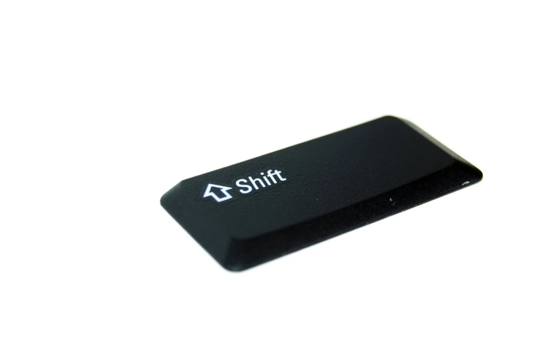 a usb device with the text shift on it