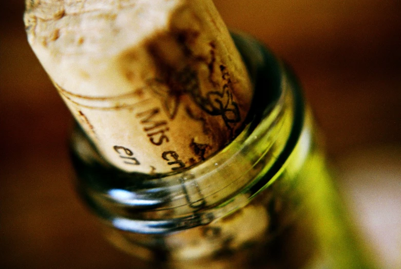 an image of a glass bottle full of wine