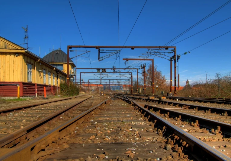 the tracks of an old train station in the country