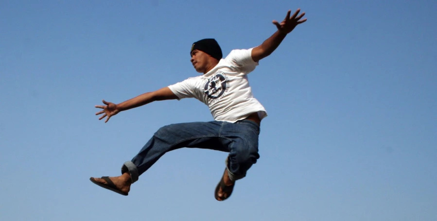 a person is performing a trick on a skateboard