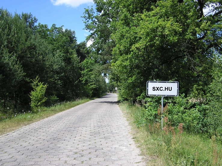 a sign for an old road in the country side
