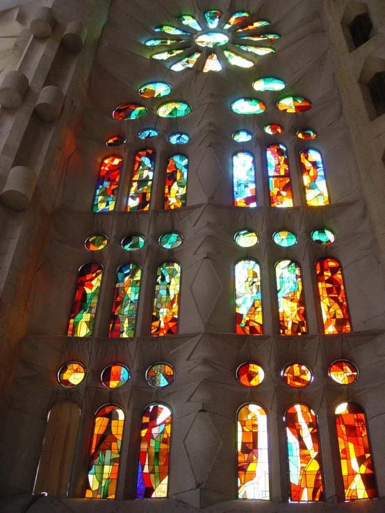 colorful stain glass and stone windows of a gothic church