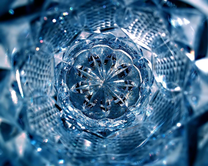 an abstract crystal design created in blue