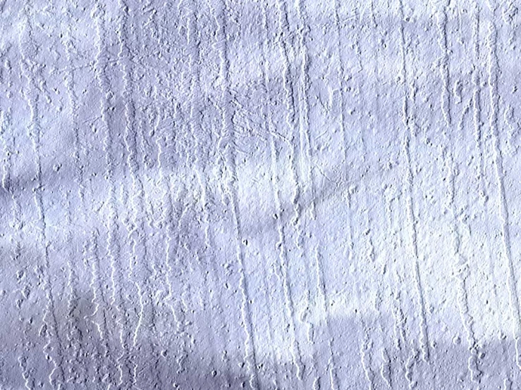 the fabric on a white cloth with a gray spot