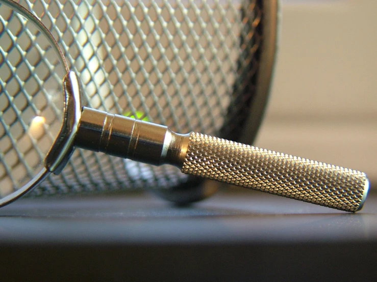 a magnifying glass sitting on top of a table