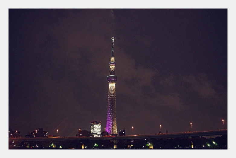 the tower is purple and white as it looks dark