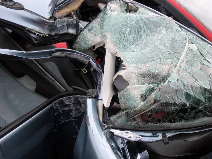 damaged windshield on a car that was struck in a traffic accident