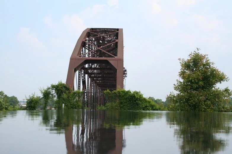 a bridge in the middle of some water