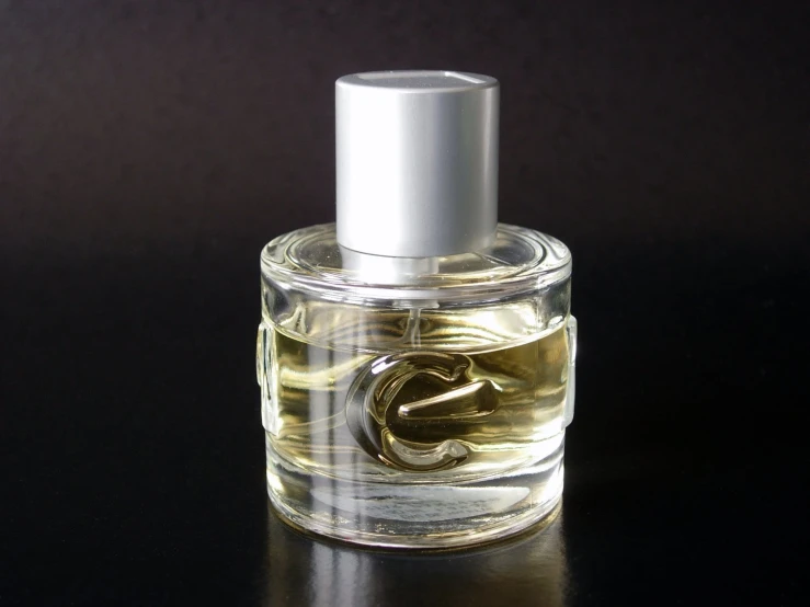 a close up of a bottle of perfume