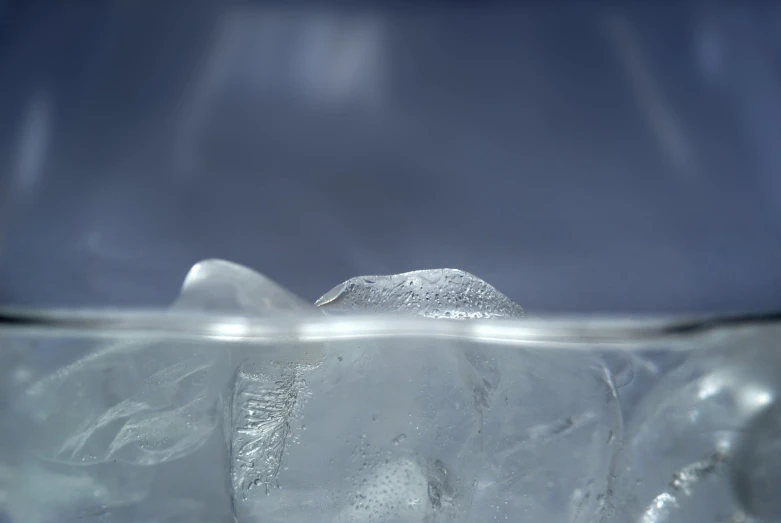 an ice cube is shown on the water
