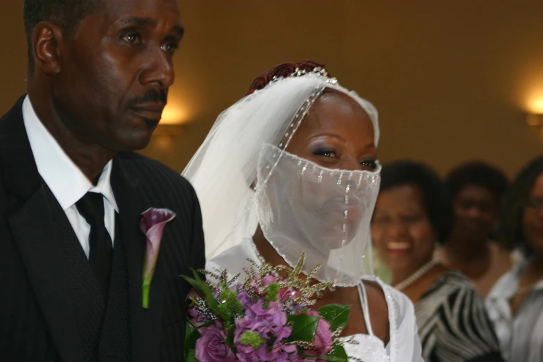 an african american bride and groom during a wedding ceremony