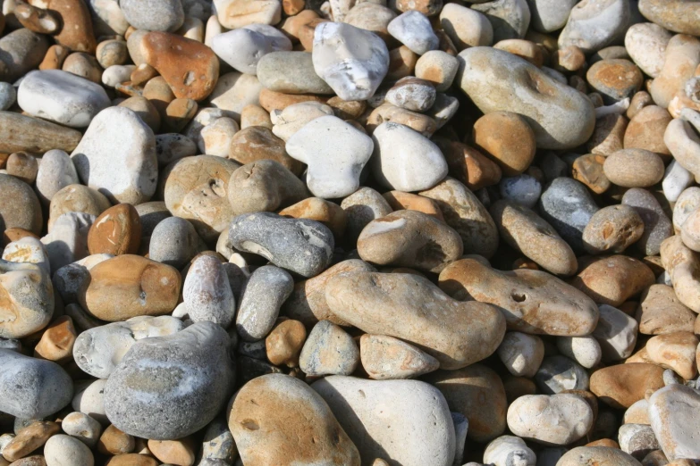 a pile of stones and pebbles are on the ground