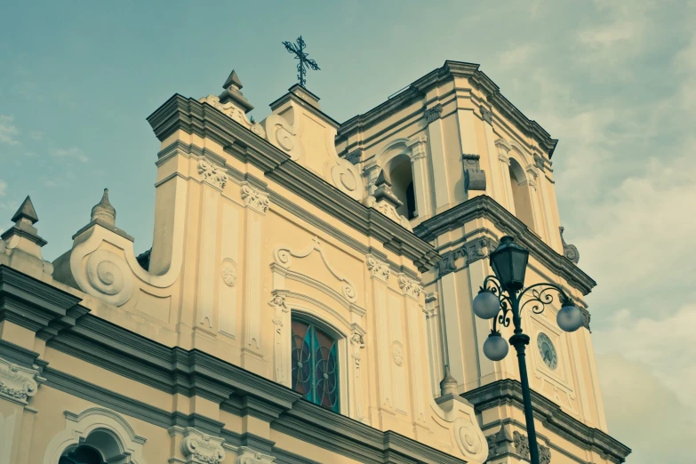 a cathedral church is next to another structure