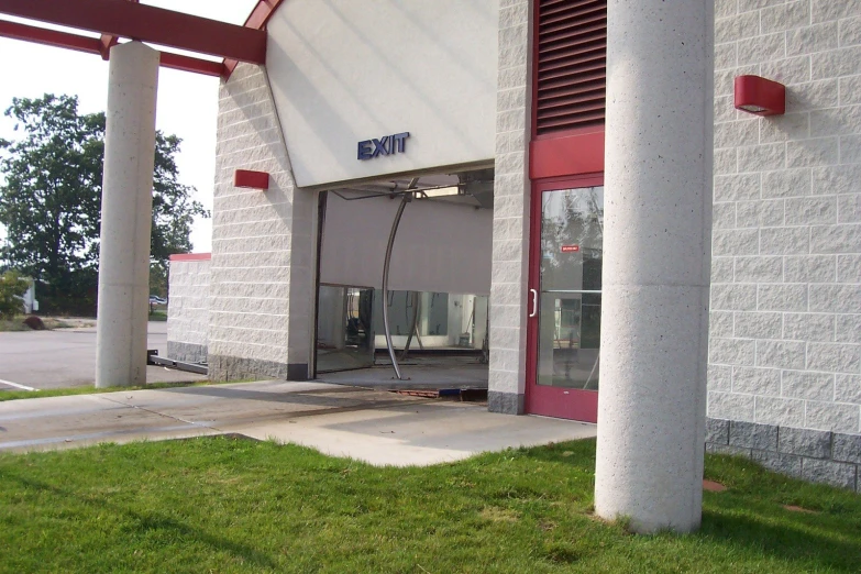 a po taken of the front door to a storage building