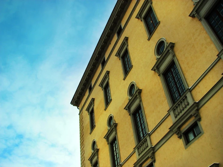 this image depicts the side of a building with blue sky in the background