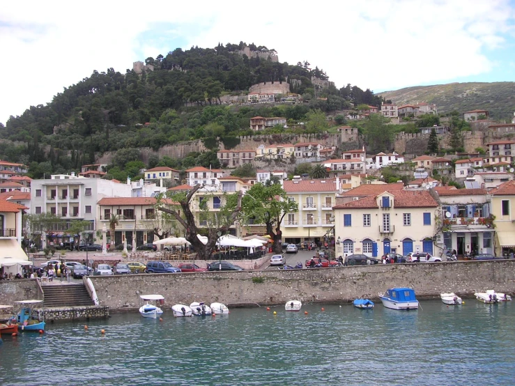 an aerial view of the water and buildings in the village