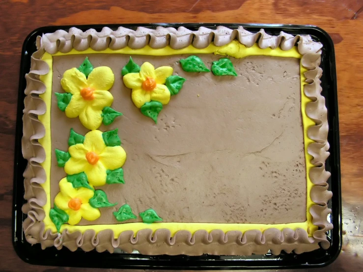 a decorated cake with flower decoration on the top