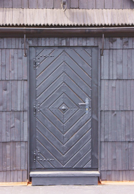 a very large and nice looking wooden door