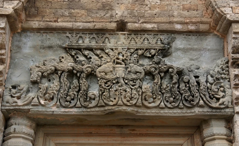 ornate carving on an old building facade