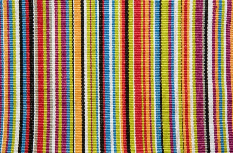 a piece of cloth with lots of different color