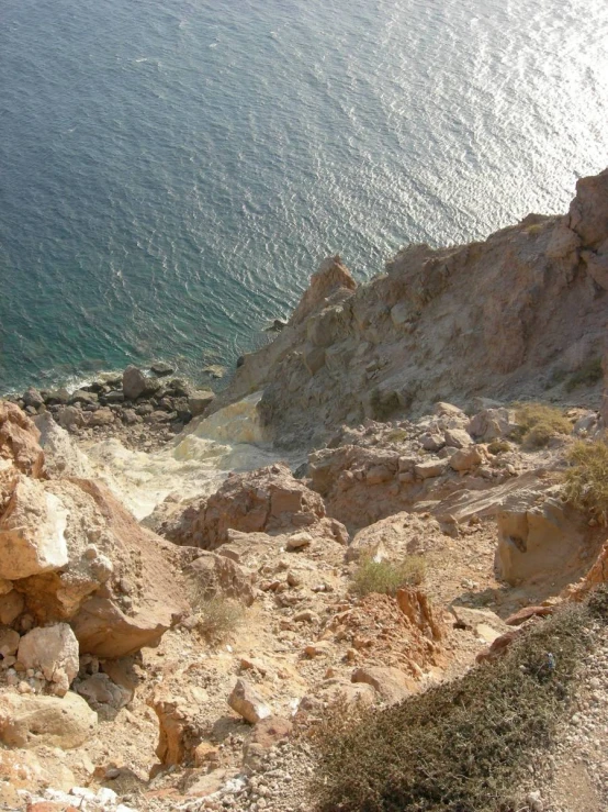 a rocky outcropping near a body of water